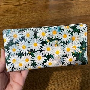 Kate Spade daisy lacey bifold wallet.